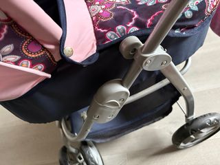 Carrito de muñecas con bolso