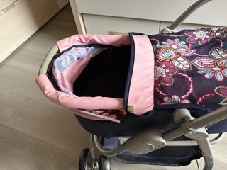 Carrito de muñecas con bolso
