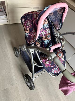 Carrito de muñecas con bolso