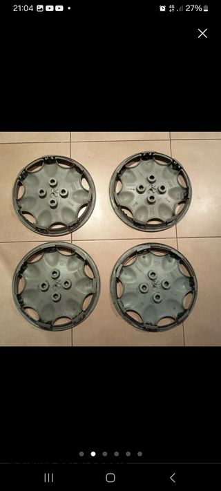 Tapa cubos peugeot 106 , 4 tapacubos 