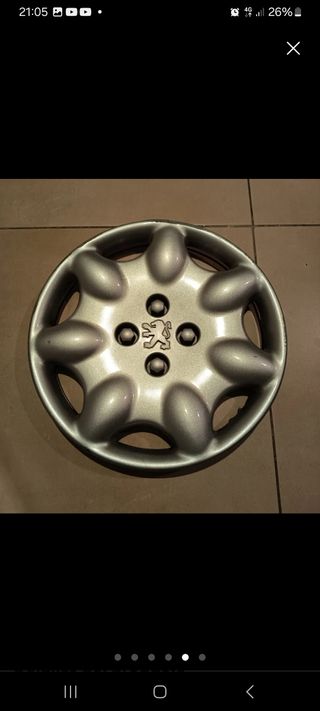 Tapa cubos peugeot 106 , 4 tapacubos 