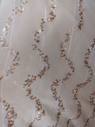 Tessuto georgette con paillettes