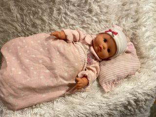 Bebé Reborn con dos vestidos