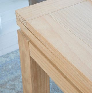 Mesa de comedor extensible de madera