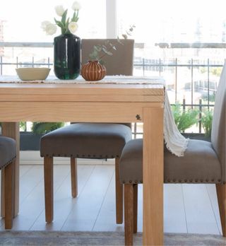 Mesa de comedor extensible de madera