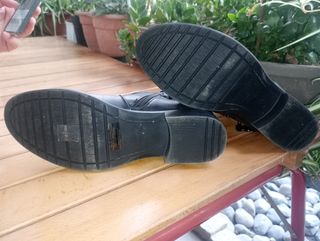 Stivaletti neri Primadonna con catena