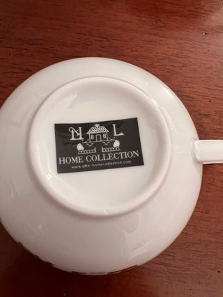 Teiera con tazza e piattino mucca