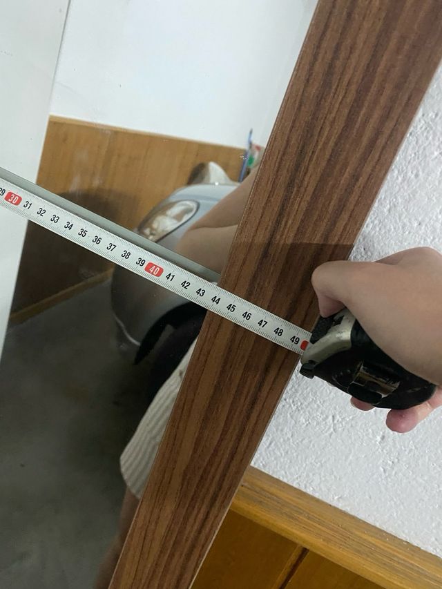 Espejo de cuerpo entero con marco de madera