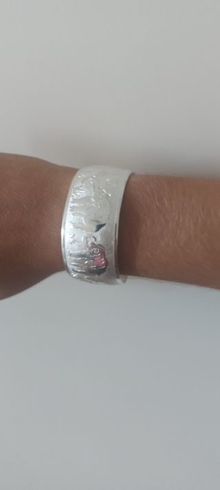 Pulsera de elefantes plateada