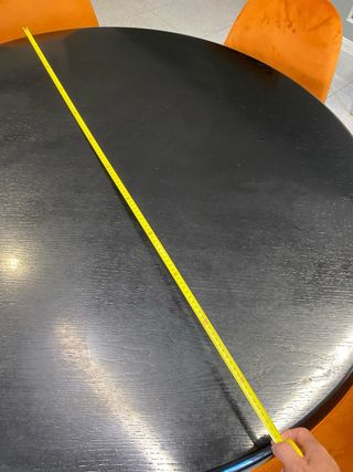 Mesa redonda madera negra 120x120 casi nueva