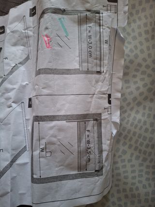 Estore enrollable térmico gris y blanco