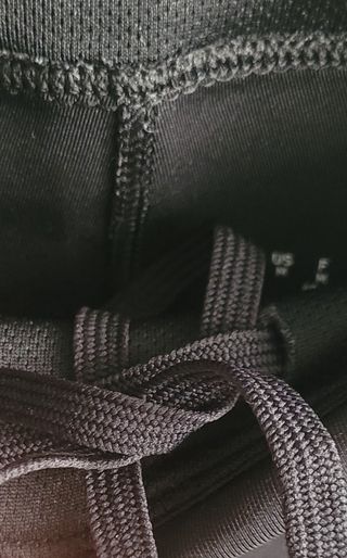 Mallas deportivas Adidas negras con rayas rosa