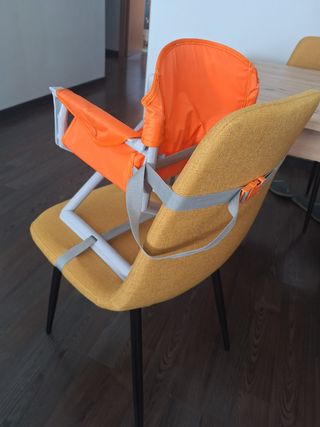 Trona de viaje naranja