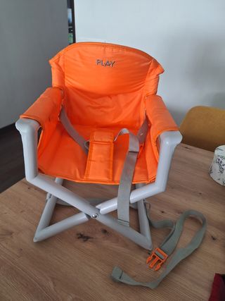 Trona de viaje naranja