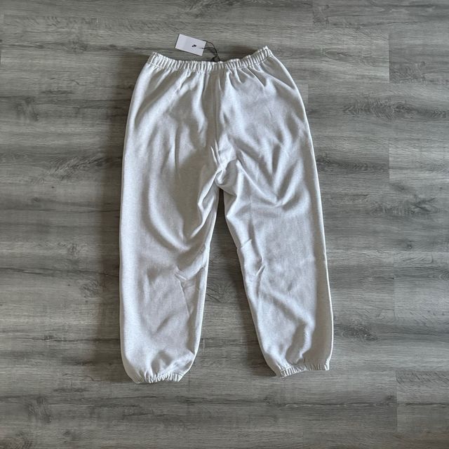 Nike Solo Swoosh Fleece Joggers Grises