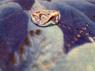 Anello con cuori intrecciati