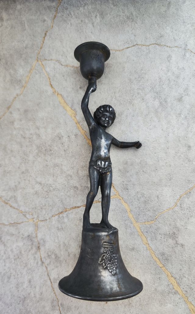 Candelabro
niño vintage metal plateado