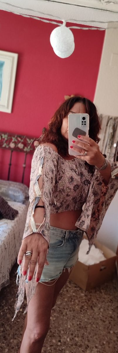 Blusa estampada manga larga