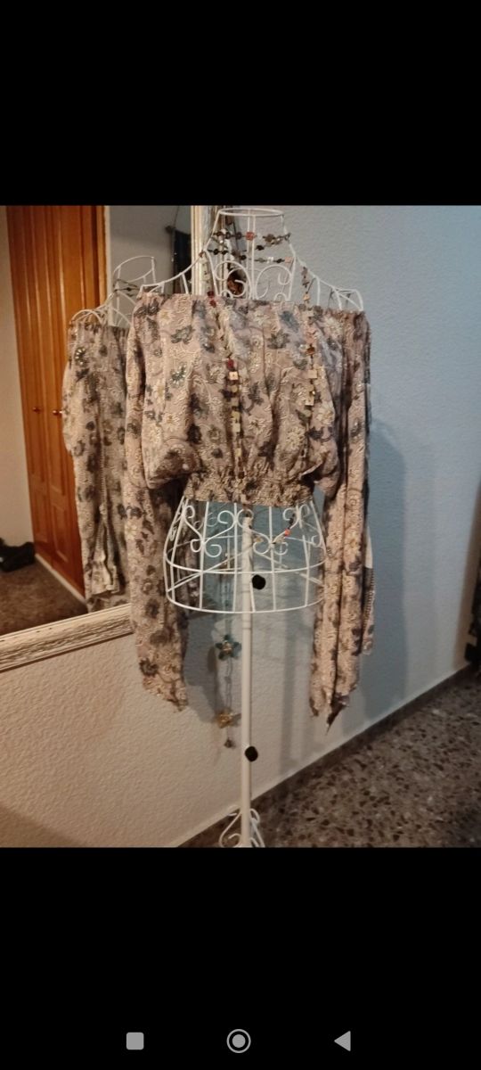 Blusa estampada manga larga