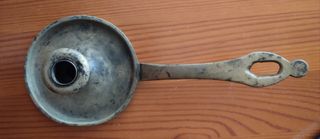 Antigua palmatoria de latón