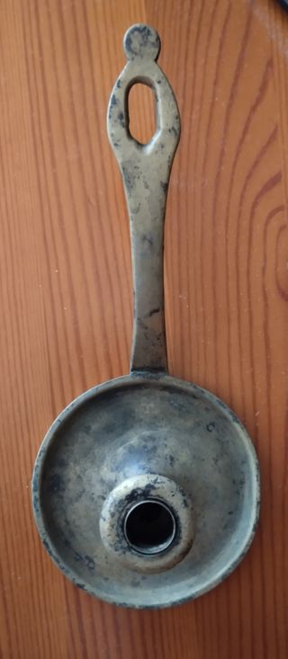 Antigua palmatoria de latón