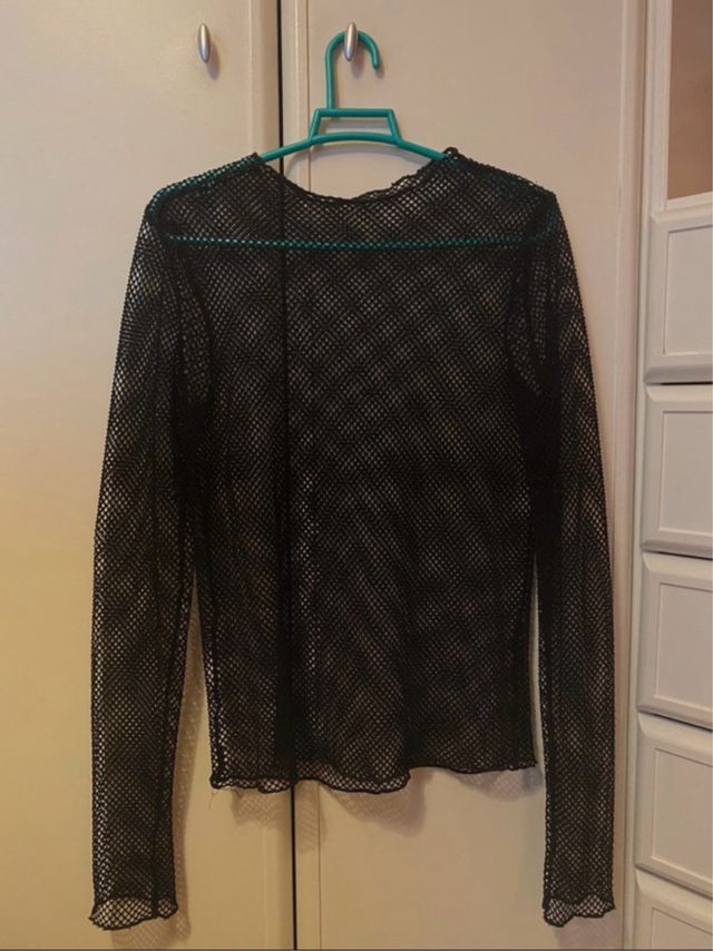 Blusa de malla transparente negra