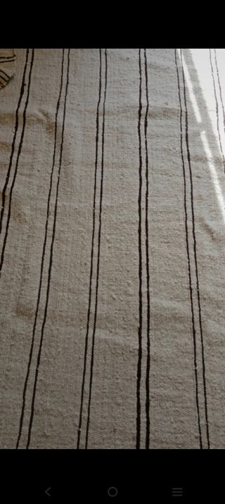 Alfombra de lana beige con rayas marrones