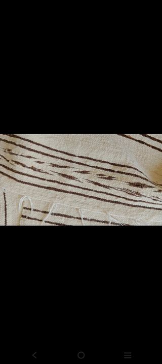 Alfombra de lana beige con rayas marrones