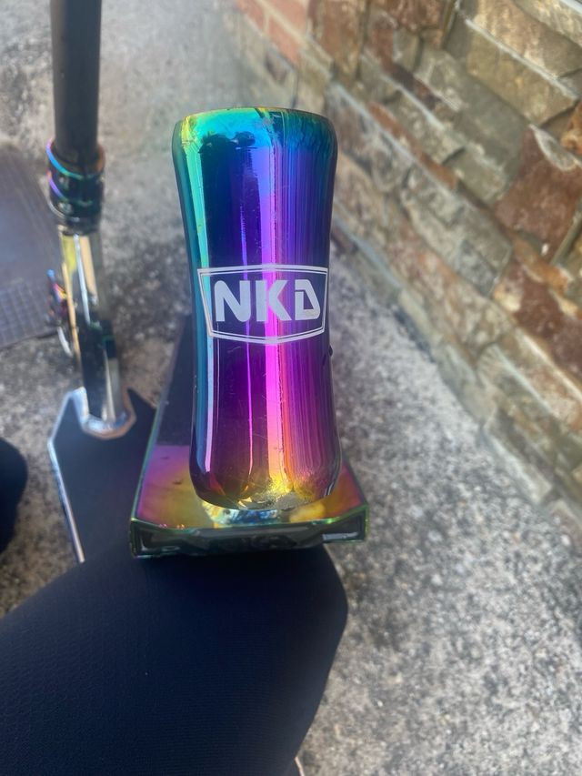 Monopattino freestyle con ruote iridescenti