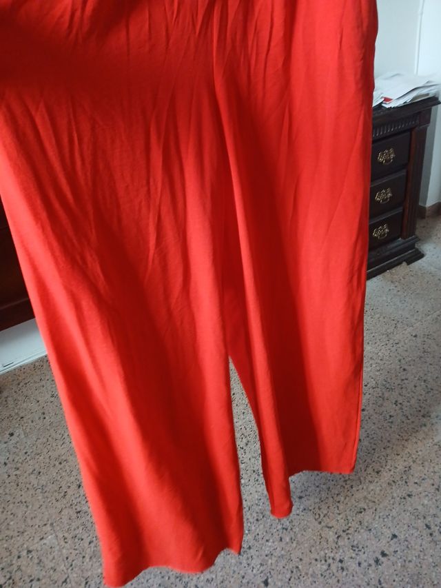 Tuta mono in tessuto rosso taglia L