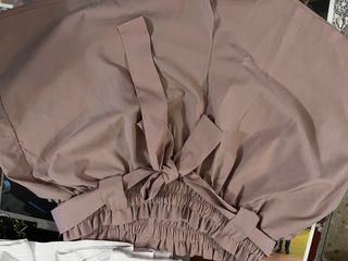 Falda rosa con lazada