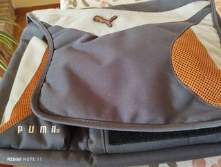 Bandolera de estudio gris.