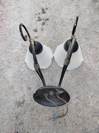 Faroles de casa de cristal y metal