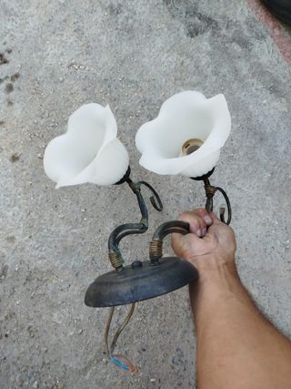 Faroles de casa de cristal y metal