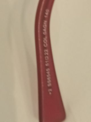 Occhiali da sole rossi e viola siting vintage