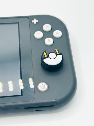 Nintendo Switch Lite – Grigia con Gommini Pokemon