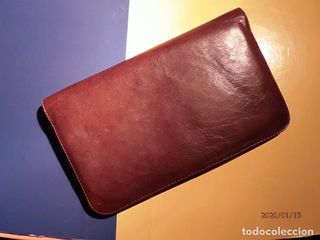 Billetera antigua de piel mujer.