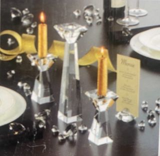 2 Portavela de cristal. Precio por unidad 13 Euros