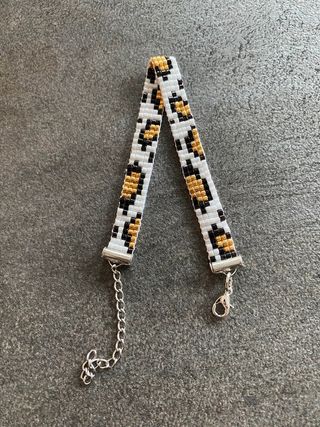 Braccialetto perline leopardato oro bianco