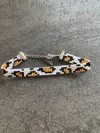 Braccialetto perline leopardato oro bianco