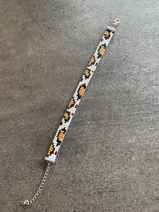 Braccialetto perline leopardato oro bianco