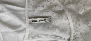 Camisa blanca fluida con encaje