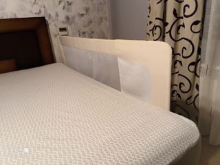 Barrera abatible seguridad cama bebé