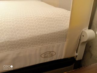 Barrera abatible seguridad cama bebé
