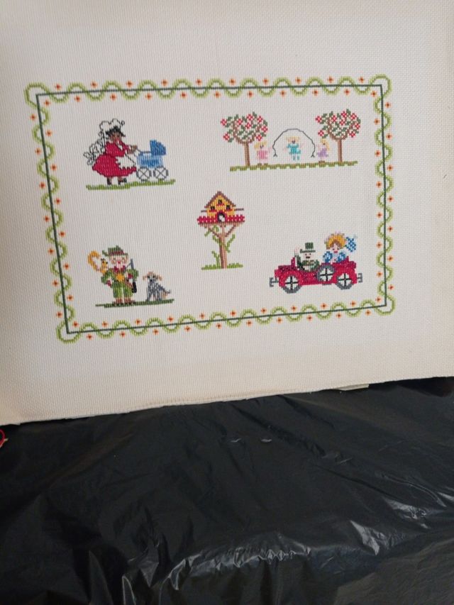 Tapiz de punto de cruz hecho a mano