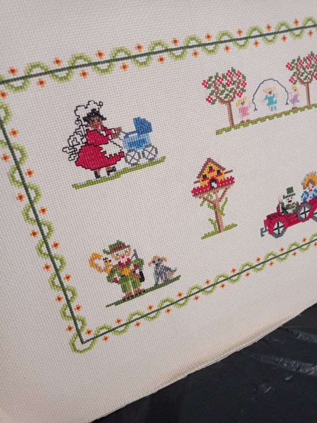 Tapiz de punto de cruz hecho a mano