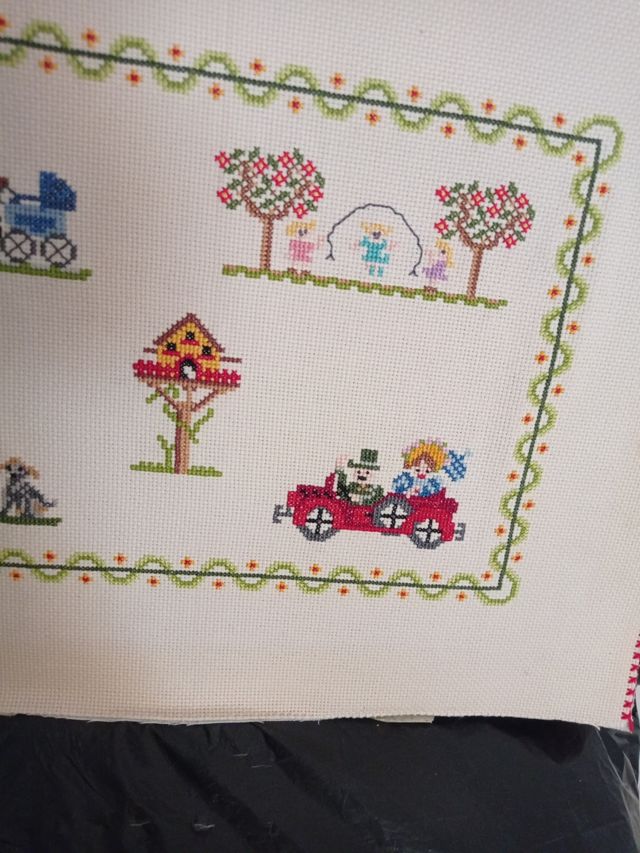 Tapiz de punto de cruz hecho a mano