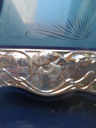 Marco de fotos decorativo metal  plateado.