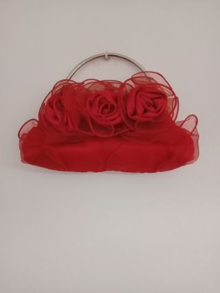 Bolso de mano rojo con flores