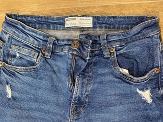 Pantalones vaqueros Bershka desgastados 